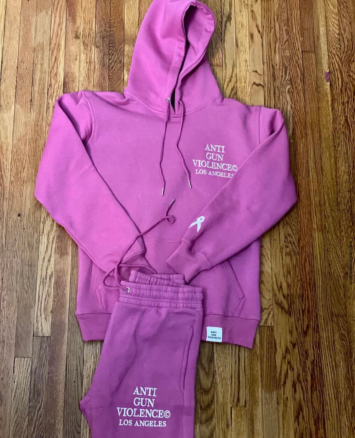 BREAST CANCER AWARENESS ANTI GUN VIOLENCE SEATSUIT